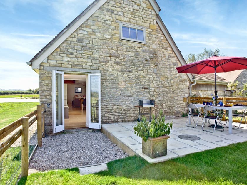 Spacious patio area | Antells Farm Barn, Sturminster Newton