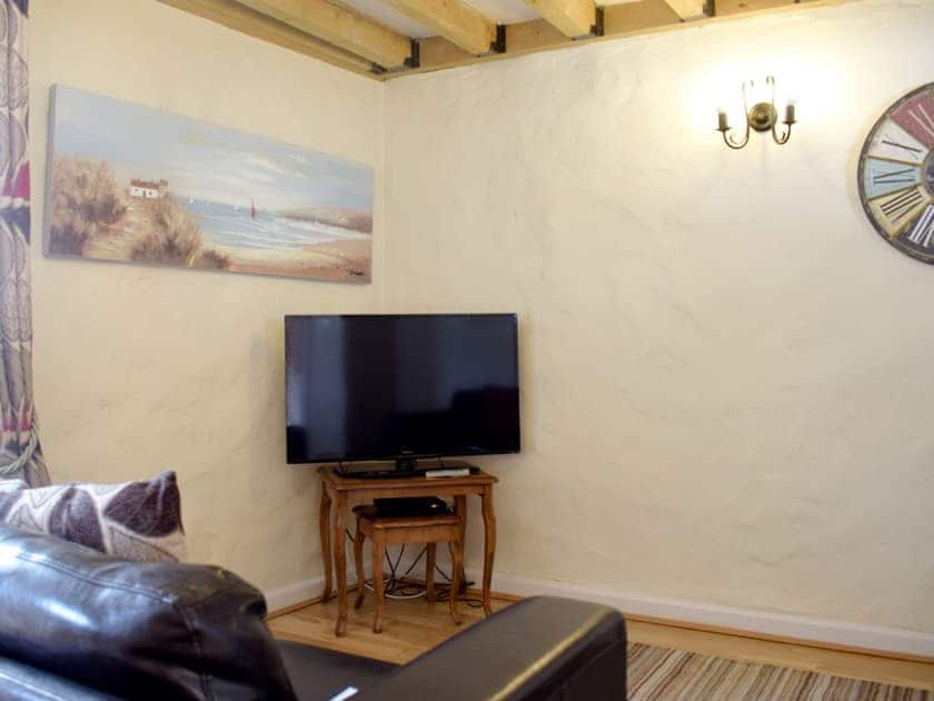 Living room/dining room | Boot Cottage - Celtic Haven Resort, Lydstep, near Tenby