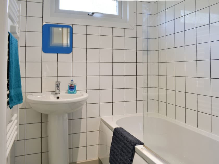 Family bathroom with shower over bath | Chalet 1 - Mount Hawke Holiday Bungalows, Mount Hawke, near Redruth