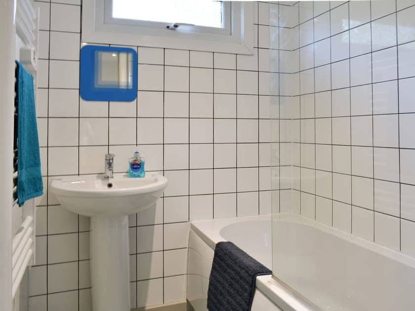 Family bathroom with shower over bath | Chalet 2 - Mount Hawke Holiday Bungalows, Mount Hawke, near Redruth