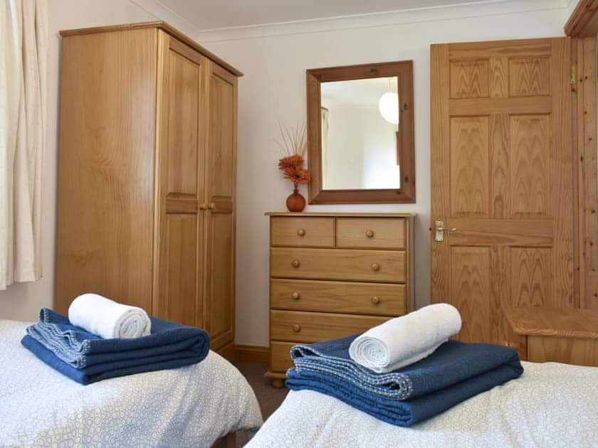 Ample storage within the twin bedroom | Prince Croft Cottage - Mount Hawke Holiday Bungalows, Mount Hawke, near Redruth