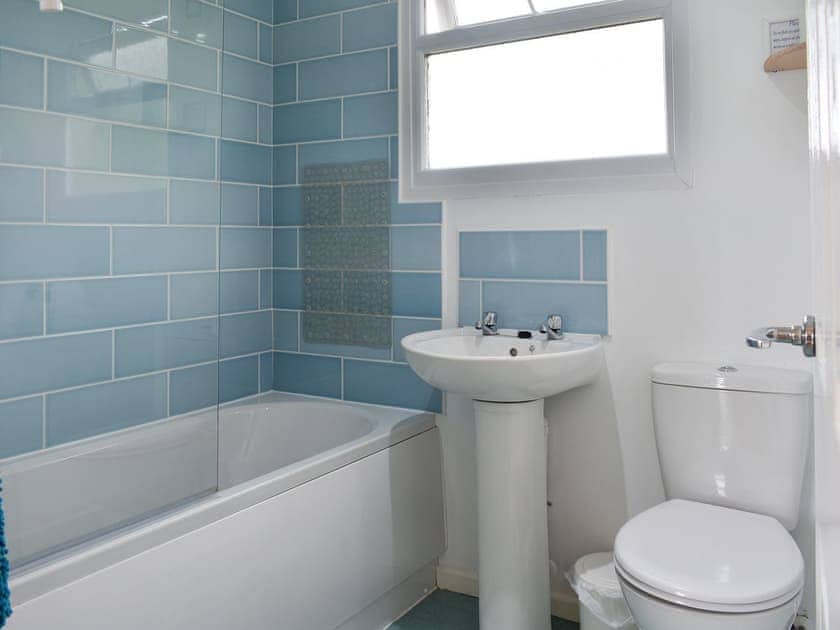 Family bathroom with shower over bath | Chalet 6 - Mount Hawke Holiday Bungalows, Mount Hawke, near Redruth