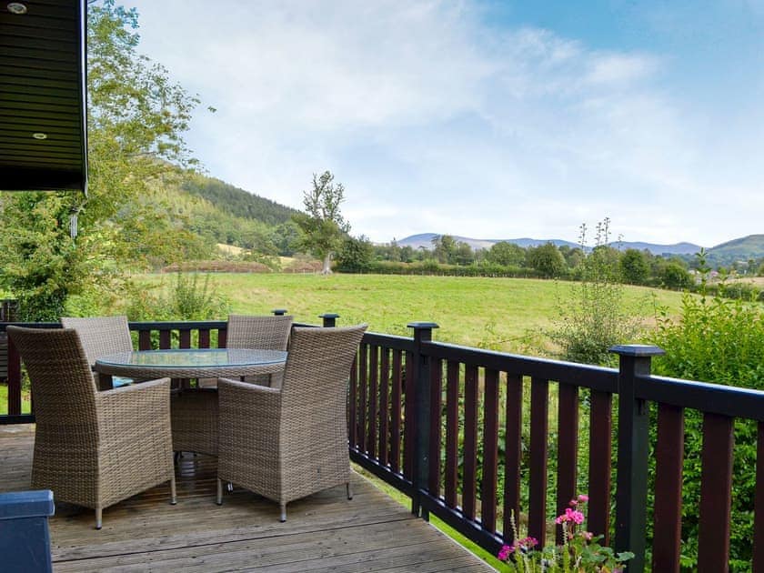Relaxing decked terrace with stunning open views | Borrowdale Lodge - Burnside Park, Keswick