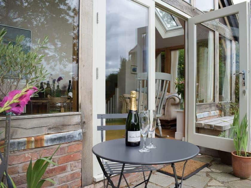 Lovely sunny sitting out area | The Garden Retreat, Marbury, near Whitchurch