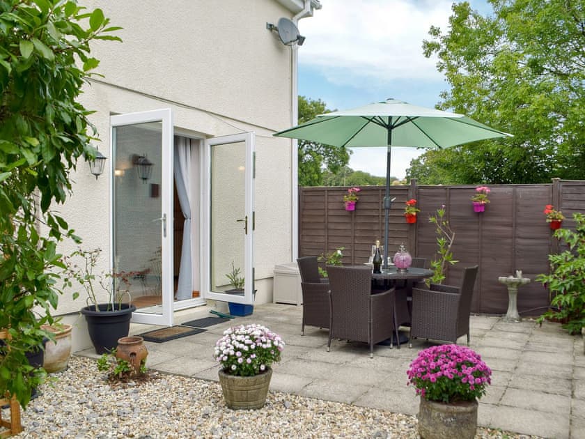 Patio with sitting out area | Dove Cottage, Pontyates, near Kidwelly