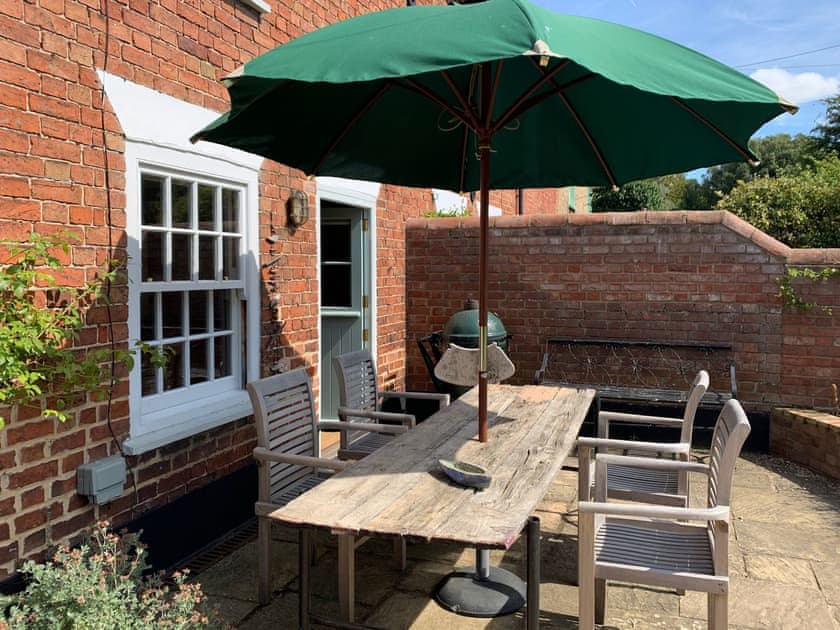 Patio area with outdoor furniture | Coastguard’s Cottage, Burnham Overy Staithe, near Burnham Market