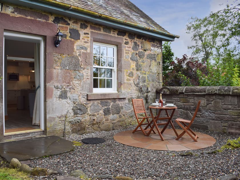 Secluded sitting out area on the gravelled patio | The Old Stables at Westerton - Westerton, Crieff