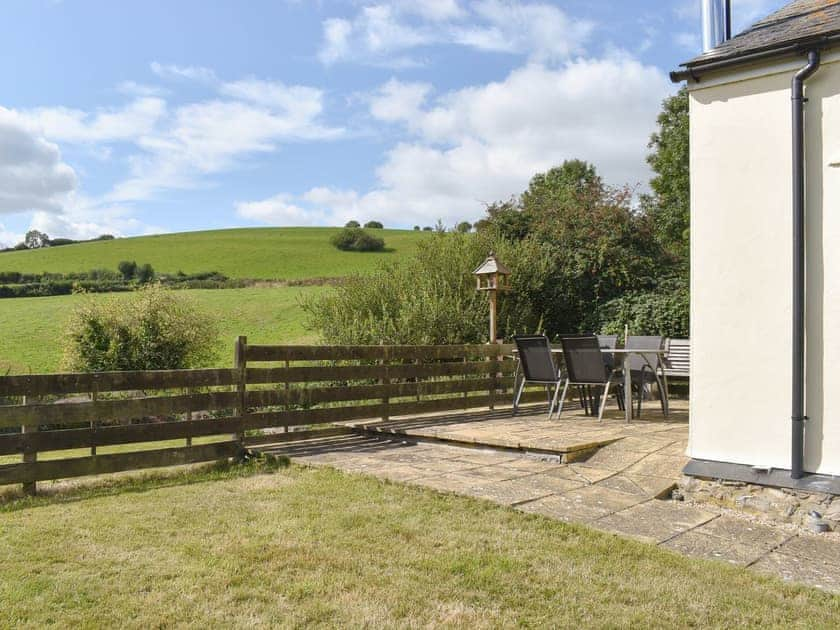 Enclosed garden area with patio | The Old Dairy, Thorncombe, near Broadwindsor