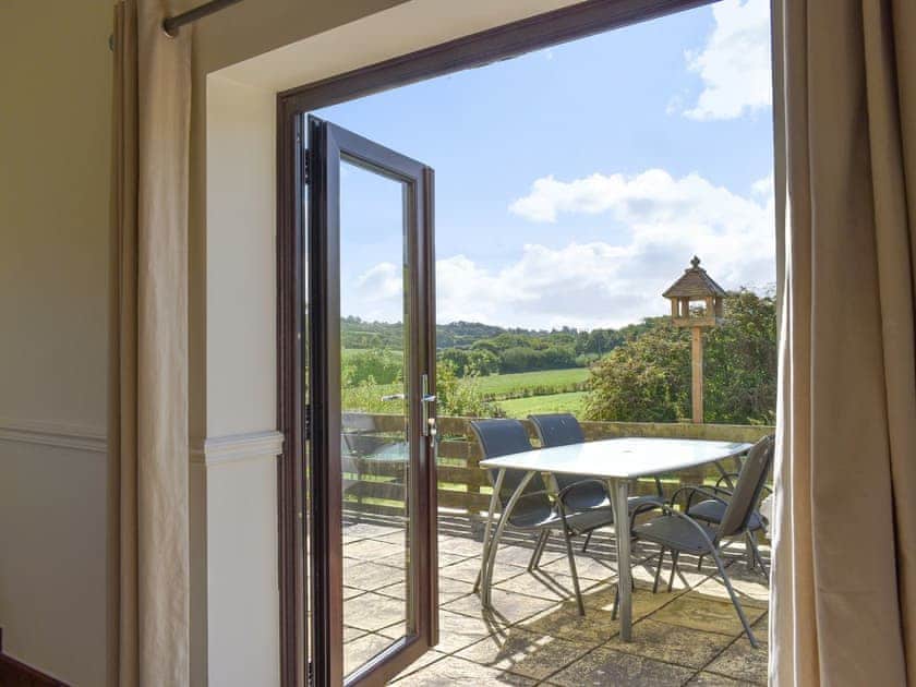 French doors to patio area and garden | The Old Dairy, Thorncombe, near Broadwindsor