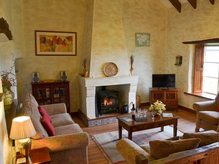 Living room with wood burner | Provence - Tregrill Farm Cottages, Menheniot, near Liskeard