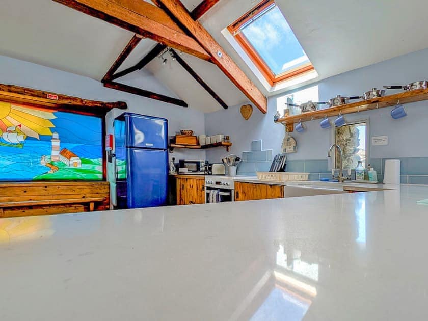 Kitchen in open plan living space and stained glass | New England - Tregrill Farm Cottages, Menheniot, near Liskeard