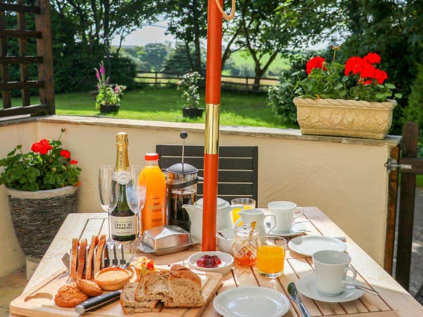 Patio with garden furniture and barbecue | Kernewyck - Cartole Cottages, Pelynt, near Looe