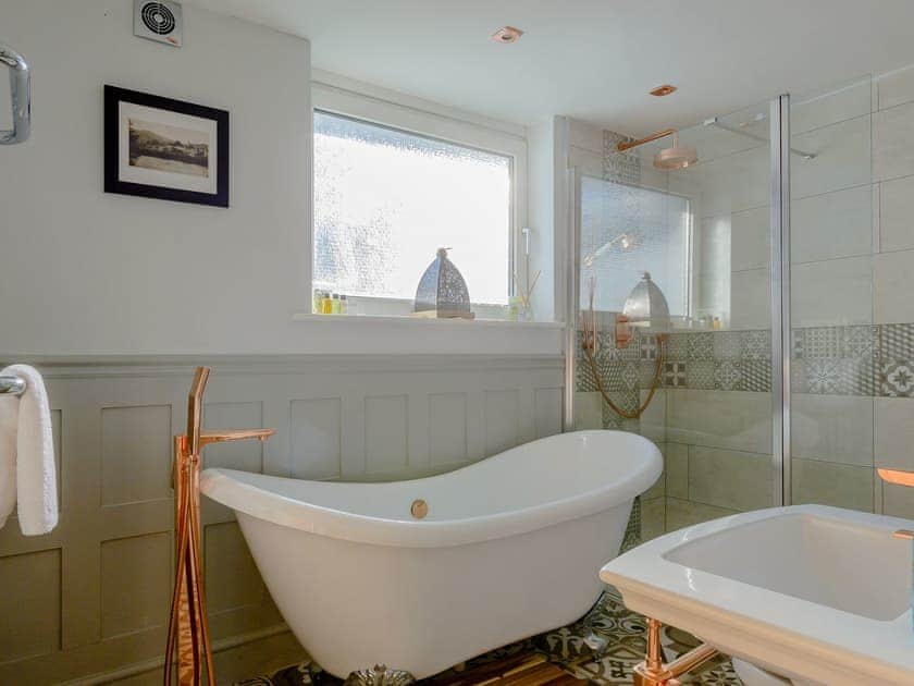 Bathroom with roll-top bath and separate shower | Honeycott, Llangattock, near Crickhowell