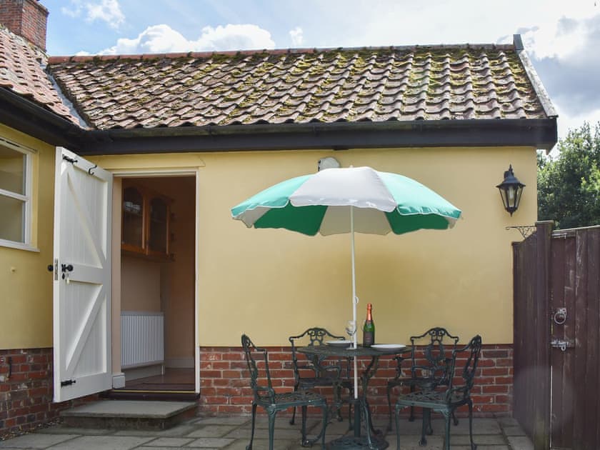 Delightful outdoor area with table and chairs | The Old Dairy, Mellis, near Eye