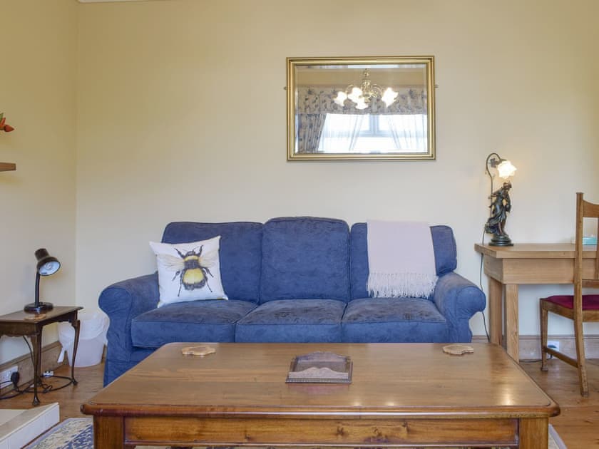 Comfortable seating within living area | Hill View House - Hillview Holidays, Aberfeldy