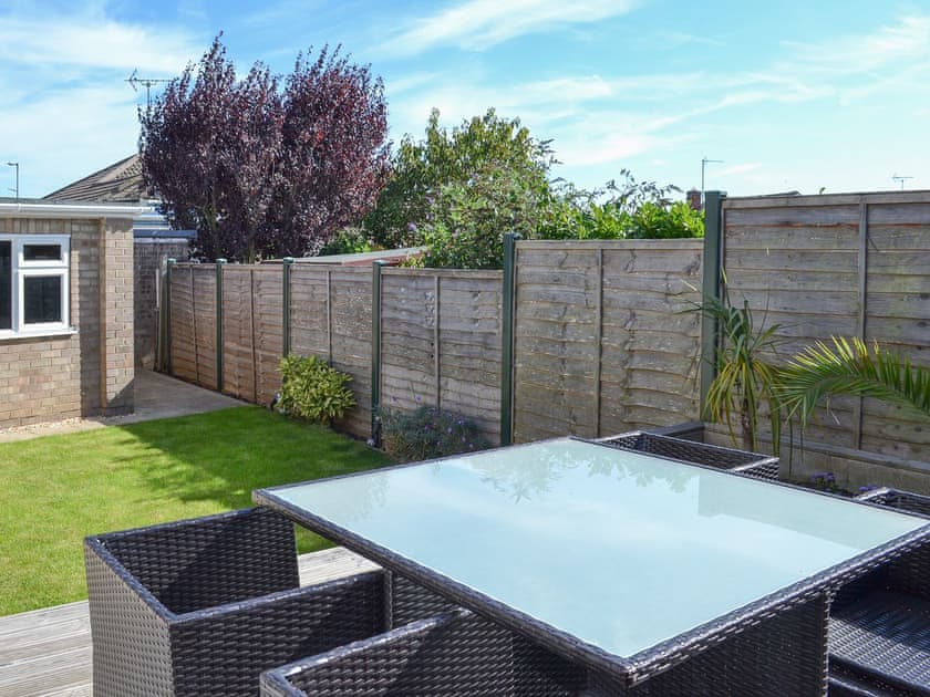 Lovely and sunny outdoor eating area overlooking the garden | Grays Cottage, Bridlington