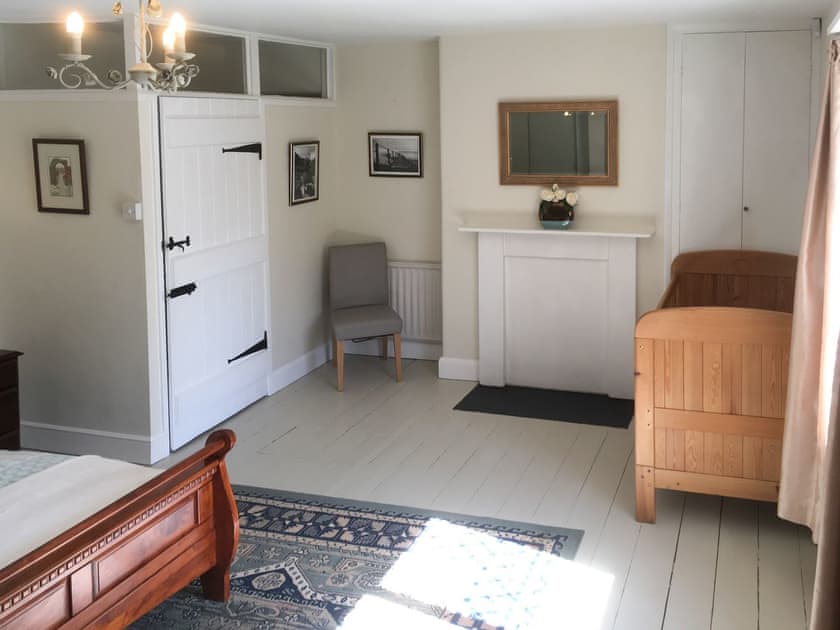 Large double bedroom with full-size cot | Park House, Harlaxton, near Grantham