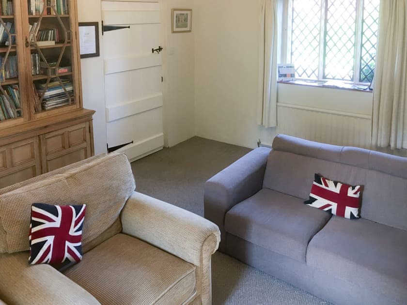 Cosy snug with lob burner and DVD player | Park House, Harlaxton, near Grantham