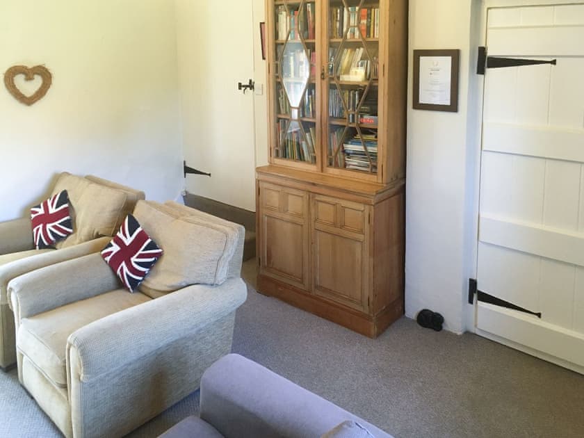 Cosy snug with lob burner and DVD player | Park House, Harlaxton, near Grantham