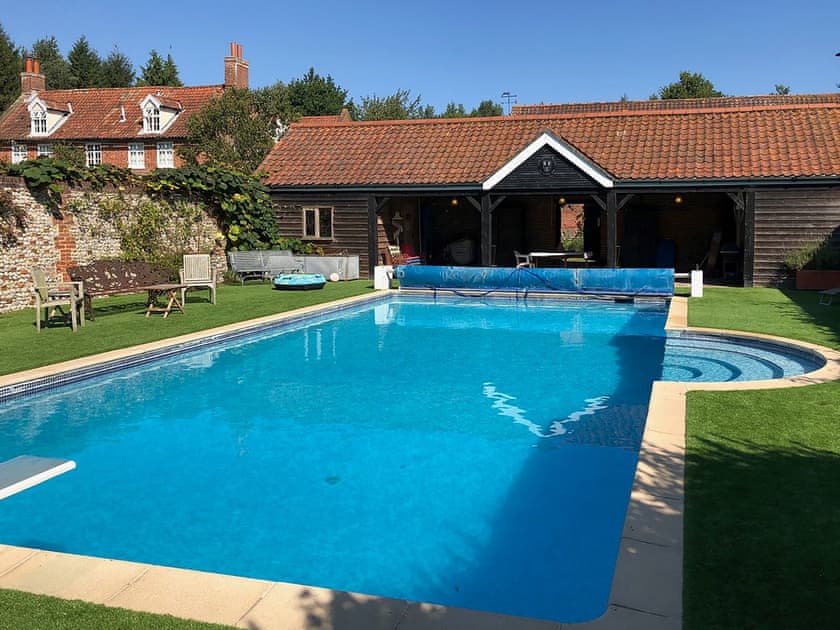 Shared heated outdoor pool | The Little House, Hempstead, near Holt