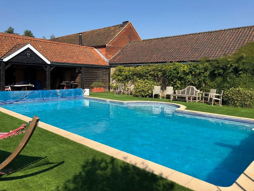 Shared heated outdoor pool | The Little House, Hempstead, near Holt