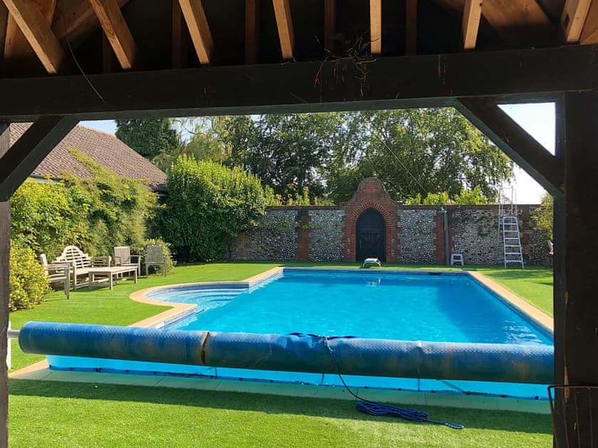 Shared heated outdoor pool | The Little House, Hempstead, near Holt