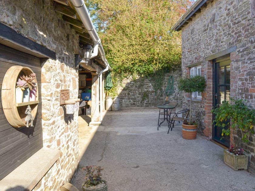 Enclosed courtyard patio area | Grace Cottage, High Bickington, near Great Torrington
