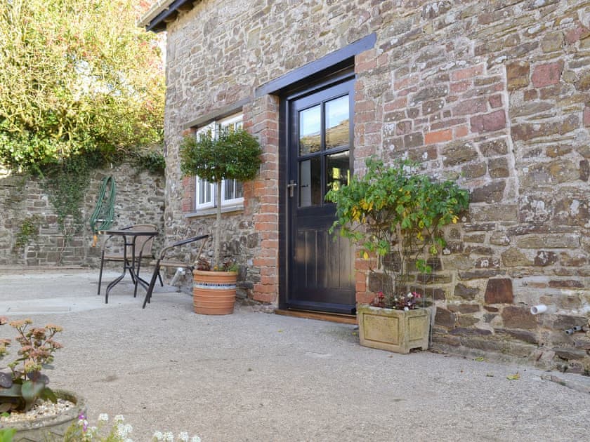 Attractive patio area with outdoor furniture | Grace Cottage, High Bickington, near Great Torrington