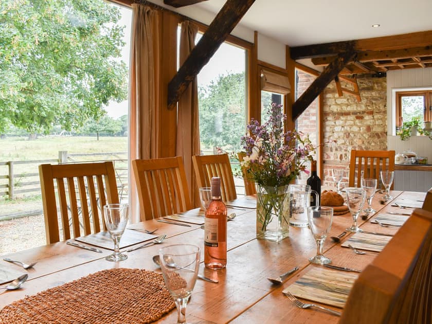 Beamed dining room with wonderful views | The Granary, Oxborough