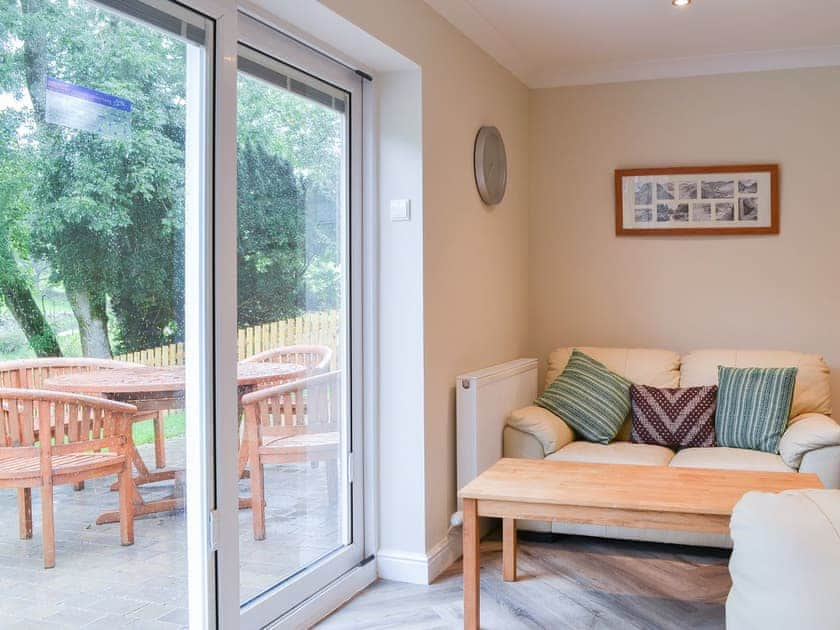 Welcoming living area | Lucy’s at the Grange - Grange Country House Holiday Cottages, Loweswater, near Cockermouth