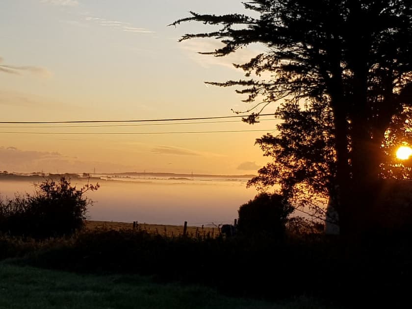 Misty morning view from the garden | Penrhos Bach, Carmel, near Llangefni