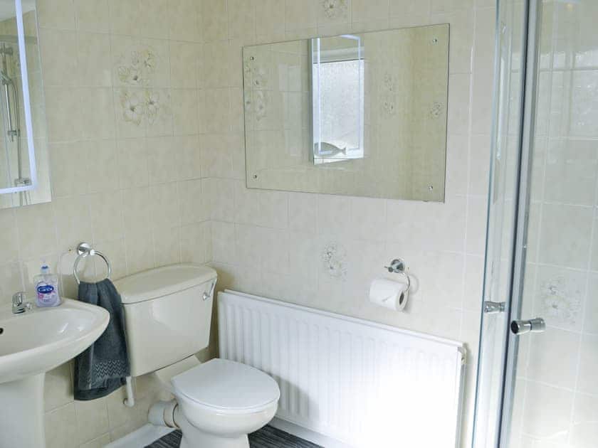 Bathroom with bath and shower cubicle | Violet Cottage, Newbiggin-by-the-Sea