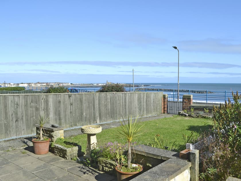 Lovely enclosed garden | Violet Cottage, Newbiggin-by-the-Sea