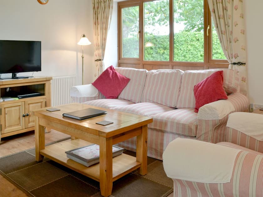 Comfy living area | Orchard Cottage - Church Farm Cottages, Lower Gresham