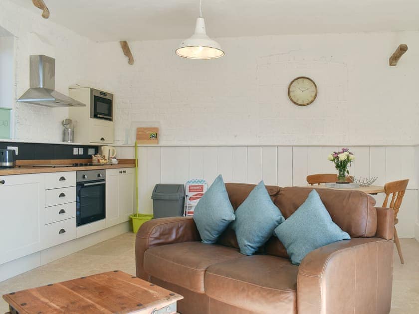 Comfy living area | Nags Stable - Milton End Farm Barns, Arlingham, near Frampton-on-Severn