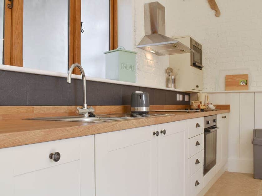 Kitchen area | Nags Stable - Milton End Farm Barns, Arlingham, near Frampton-on-Severn