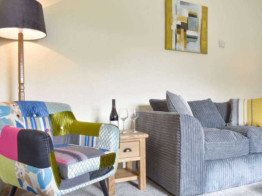 Comfortable seating within living area | Grassgarth Cottage, Redmire, near Leyburn