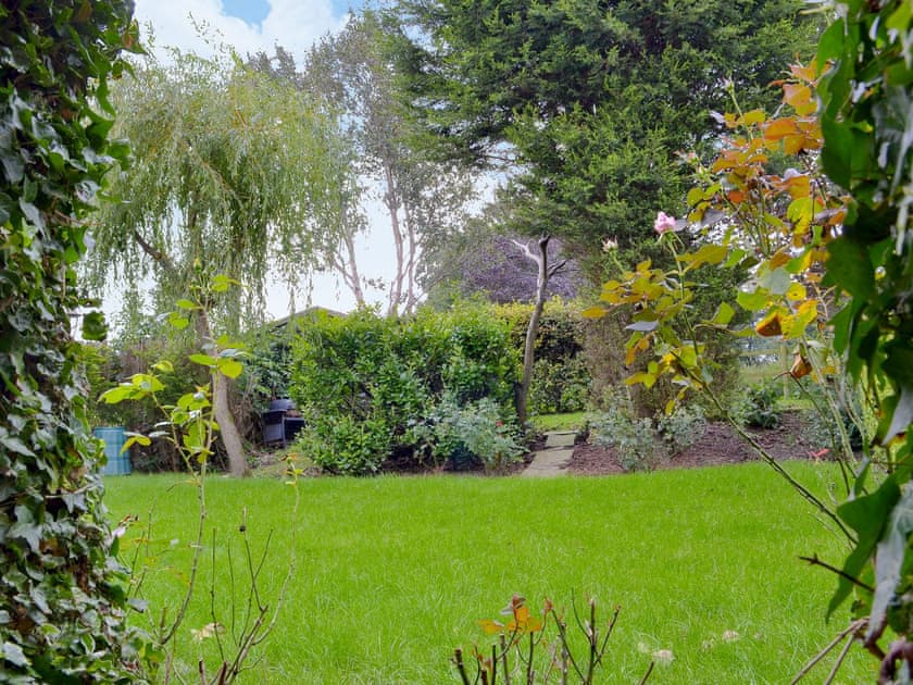Lawned garden | Wisteria Cottage - Law Farm Cottages, Southowram, near Halifax