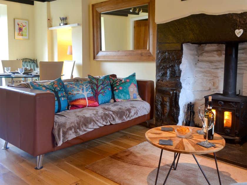Cosy living area with a lovely wood burner | Eirianfa, Penmachno, near Betws-y-Coed