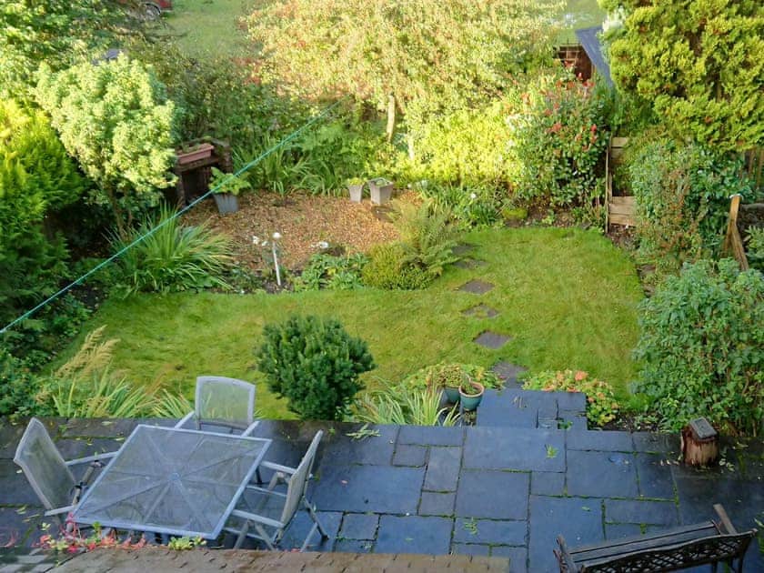 Spacious enclosed lawned garden and patio | Eirianfa, Penmachno, near Betws-y-Coed