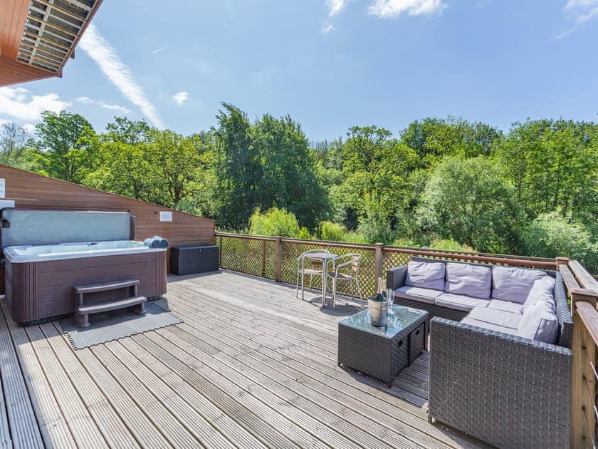 Impressive outdoor area with hot tub (Typical) | Waterside Lodge Sixteen - Ashgrove Country Park, Elland