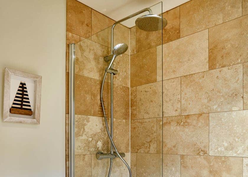 Bathroom with shower over the bath | Seascape - Saltscape, Mundesley, near North Walsham