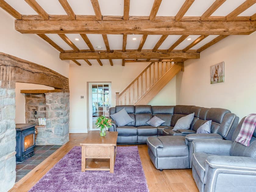 Spacious living room with wood burner | Rhiew Banc, Bwlch-y-ffridd, near Newtown