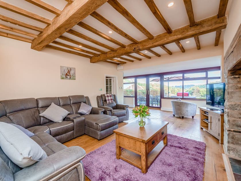 Spacious living room with wood burner | Rhiew Banc, Bwlch-y-ffridd, near Newtown