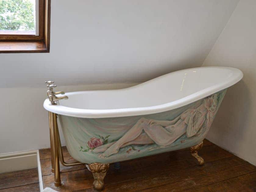 Bathroom with stand-alone slipper bath | Baker’s Cottage, Hotham, near Beverley