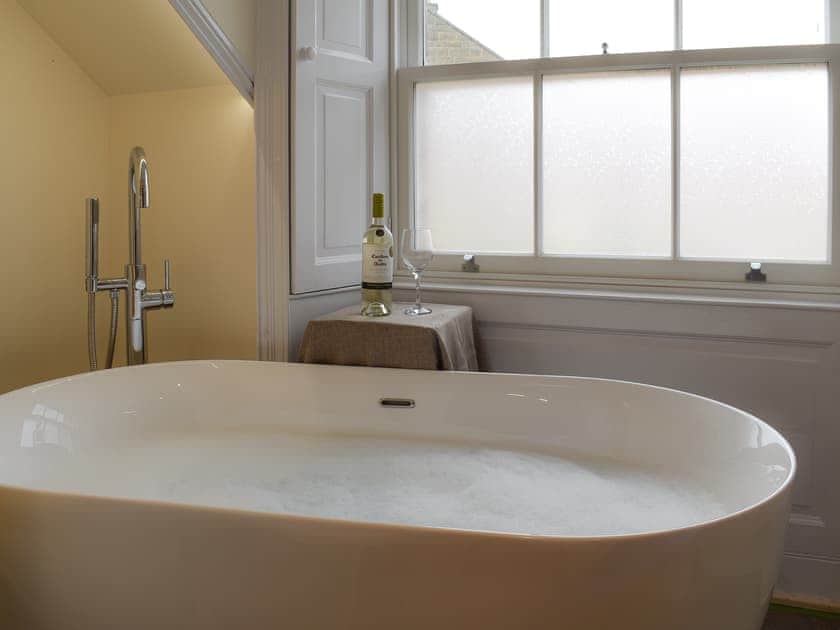 Bathroom with stand-alone bath | The Haven, Holy Island, near Berwick-upon-Tweed