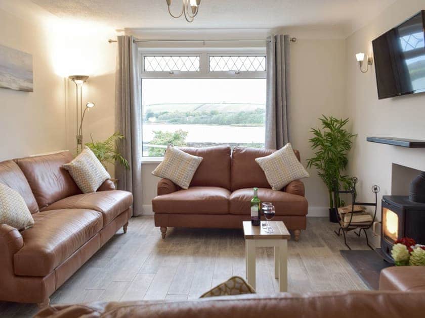 Welcoming living room with wood burner | Green Acre, St Dogmaels, near Cardigan