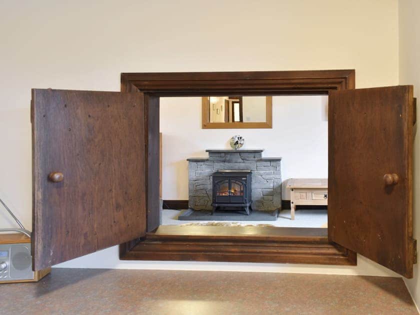 Convenient serving hatch from kitchen to living and dining room | Drumlins Cottage, Endmoor, near Kendal