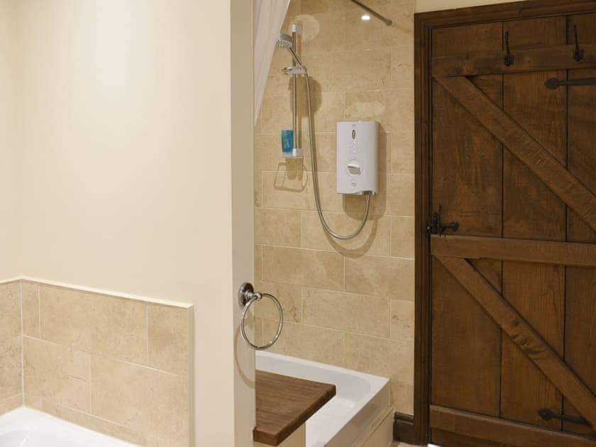 Family bathroom with bath and separate shower enclosure | Drumlins Cottage, Endmoor, near Kendal