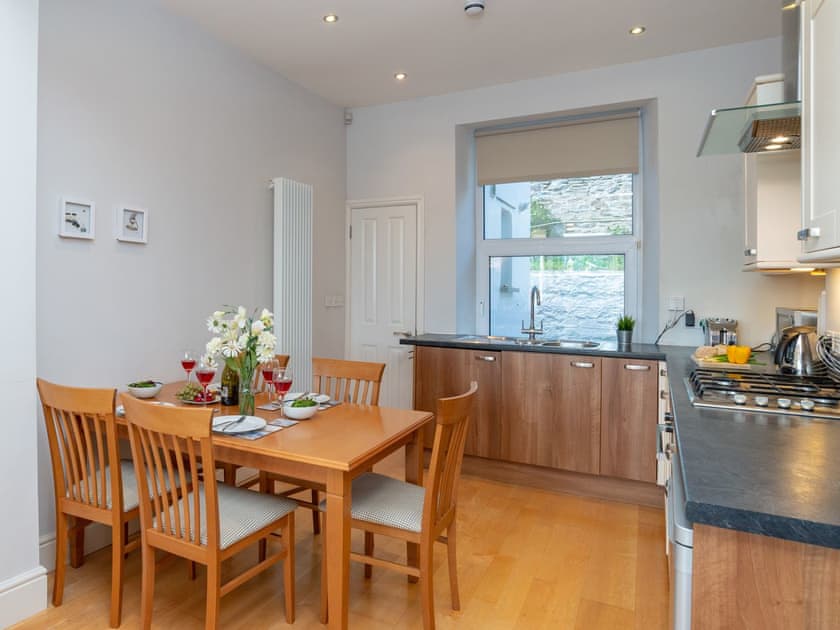 Fully equipped kitchen with dining area within the open-plan design | Apartment 2 The Wheelhouse., Fowey